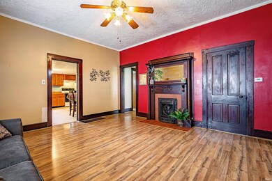 The Living Room has newer wood laminate flooring, 