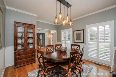 Modern & elegant formal Dining Room with hardwoods