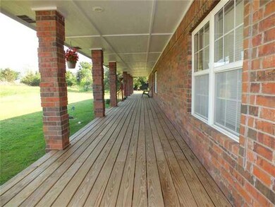 Exterior Front. 80 Foot covered porch!