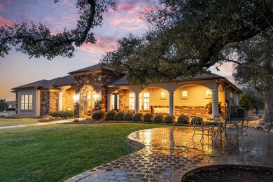 Mediterranean / spanish-style home featuring ston