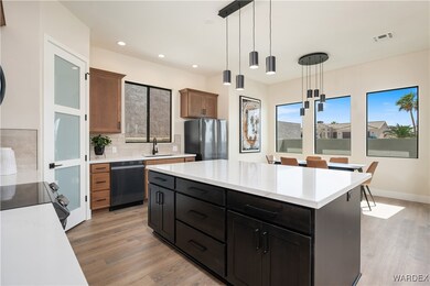 Kitchen featuring stainless steel appliances, a ki
