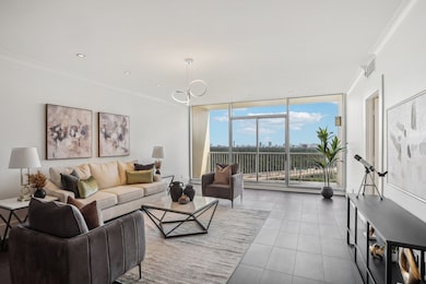 Living room with view of balcony overlooking downt