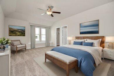 Imagine retreating to this spacious bedroom at the