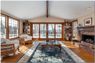 Spectacular family room with gleaming hardwood flo
