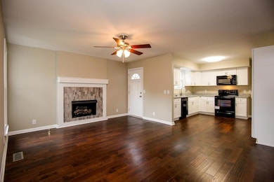 This is a great space.  Can accomodate a large table plus some chairs by the fireplace.