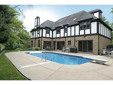 Exterior Back. Pool area and rear yard.