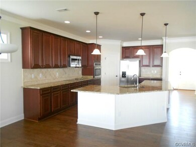 Kitchen showing all the cabinets, large counter to