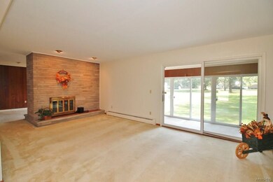 SPACIOUS  21' X 12' LIVING ROOM WITH ACCENT BRICK 
