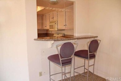 Breakfast bar pass through window from kitchen to 