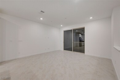 Spare room featuring recessed lighting and baseboa