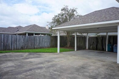 Carport and back yard area