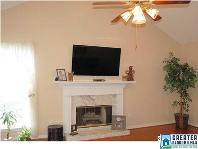 A beautiful gas fireplace is the focal point of th
