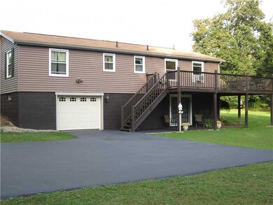 Exterior Back. This large back deck was renovated 