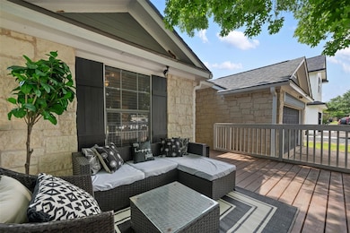 Wooden deck featuring an outdoor living space and