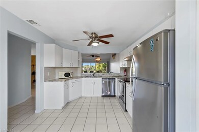 121 Gabriel Cir unit 1-108, Naples, FL 34104 - photo 7