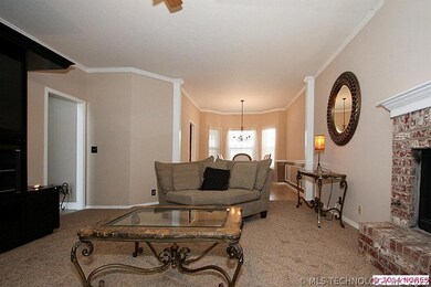Beautiful and large formal living room features a