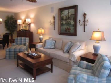 Professionally decorated & beautifully furnished living room with carpet.