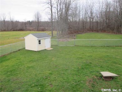 Backyard. Spacious Fenced in Back Yard....