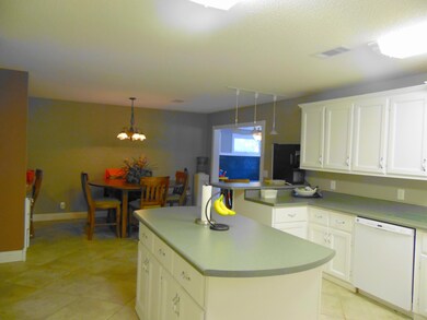 Kitchen with lots of cabinets, even under the island