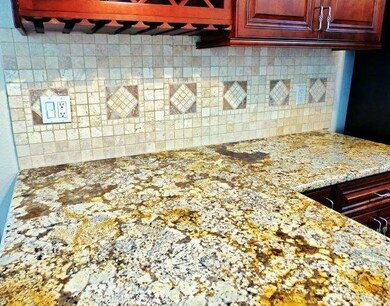 Detailed view of granite counter tops and custom t