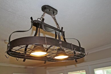 light / pot rack in kitchen