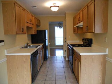 Galley type kitchen with breakfast area and bay wi
