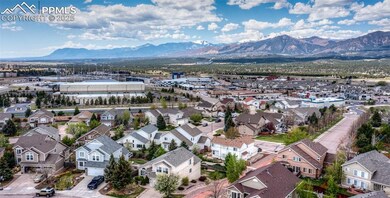 Aerial view of residential area featuring a mounta