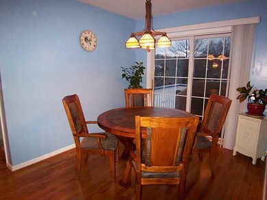 Kitchen. Eating area with slider to deck.