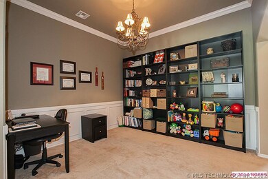 Flex room currently used as an office/play room.