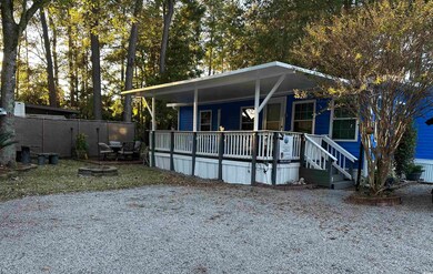 Manufactured / mobile home featuring a deck