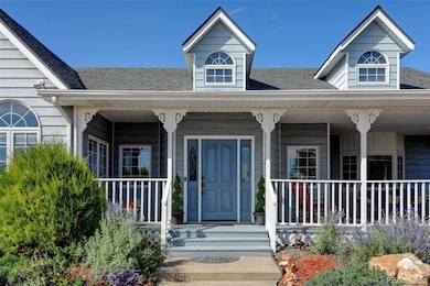 The front door & covered porch welcomes you