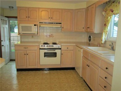 Kitchen. Zing it up with granite counter and tile