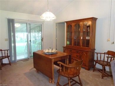 Dining room with sliding door to screened patio