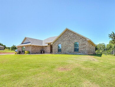 View of front of home featuring a front lawn