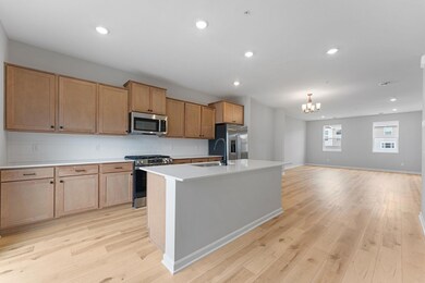 The large center island provides additional storage, seating and prep space.