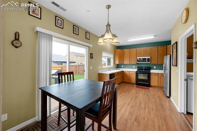 Dining Area Opens To Patio
