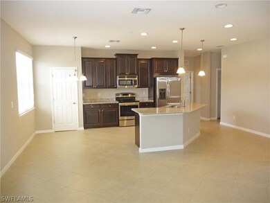 The huge Great Room area with diagonal tiled floor
