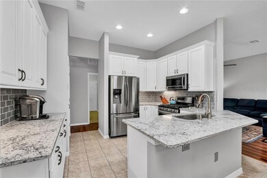 KITCHEN TILE FLOOR, QUARTZ COUNTER-TOP, STAINLESS 