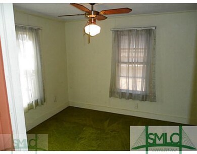 Bedroom. Front bedroom two of three. Not sure of f