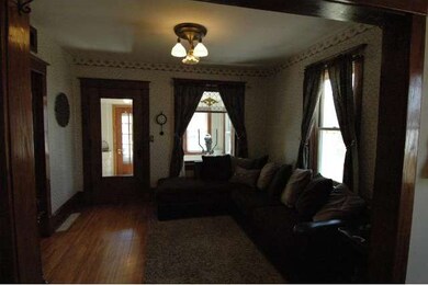 The main floor living room is loaded with charm. N