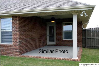 Similar photo of covered back patio