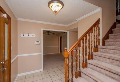 Foyer, has ceramic tiles