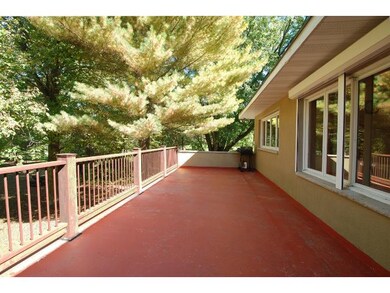 The deck is extra wide with strong railing.  Looks