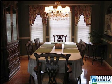 DR features beautiful hardwood floors, crown moldi