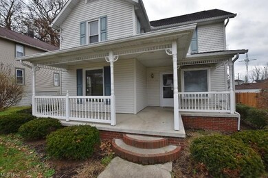 Enjoy the outdoors on this beautiful covered front