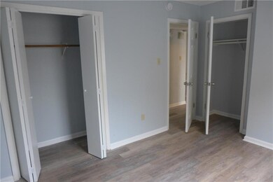Unfurnished bedroom featuring wood finished floor