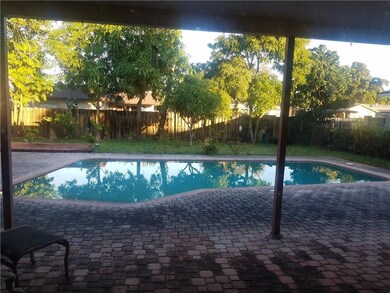 Covered Patio With Large Pool