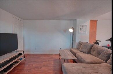 Kitchen is open to the oversized Living room