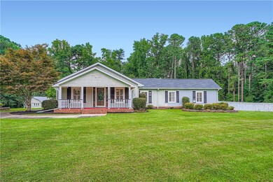 Ranch-style house featuring covered porch