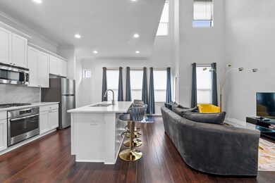 Large living area, open to kitchen on the 2nd floo